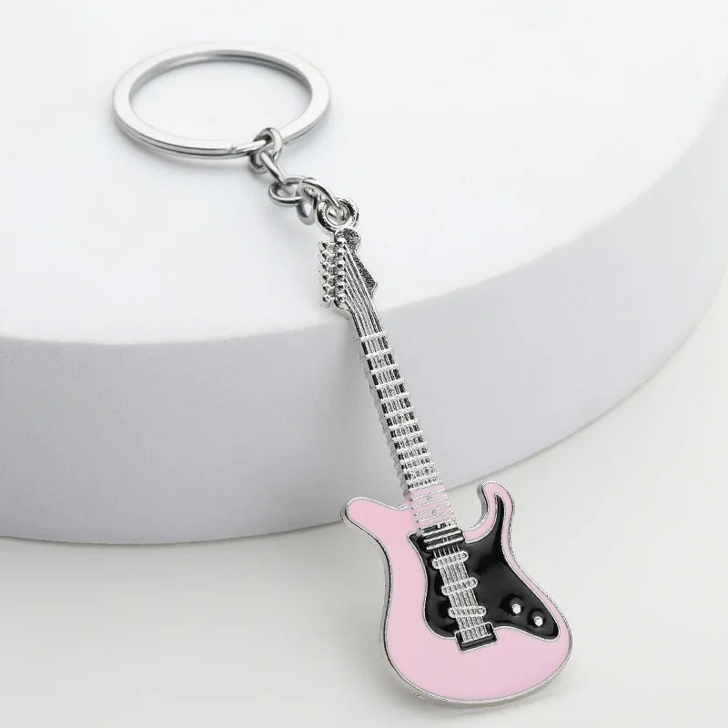 Llavero de guitarra eléctrica en aleación de zinc, souvenir para conciertos y festivales, en negro, blanco, rojo, rosa, azul o morado